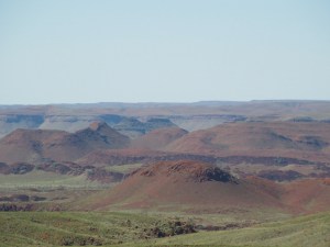 How do capture an image of hundreds of kilometres with perfect hues of green, red, brown?